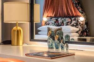 Postel nebo postele na pokoji v ubytování The Radical Asheville, Tapestry Collection by Hilton + 69 fotografií