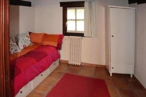 Postel nebo postele na pokoji v ubytování Albergue Rural Montebaserria
