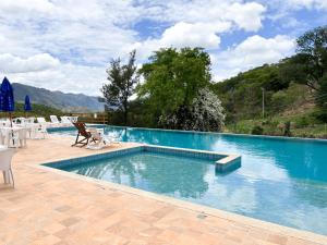 Bazén v ubytování Pousada Fazenda do Engenho nebo v jeho okolí