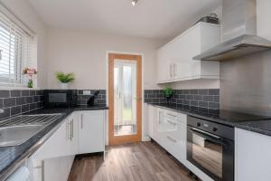 Køkken eller tekøkken på Moorland Bungalow Central Clitheroe