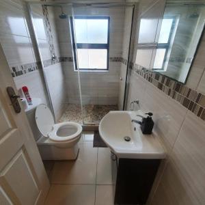 Et badeværelse på Effortless Premium Homestay - Cambridge