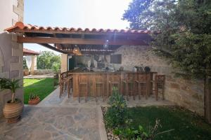En have udenfor Geroulios Kastro Villas I "Free" Heated Pools & Seaview