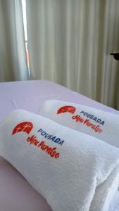 Ένα ή περισσότερα κρεβάτια σε δωμάτιο στο Pousada Meu Paraíso