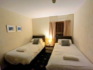 The Dame Lane في بلاكبول: سريرين توأم في غرفة بها نافذة +17 صورة