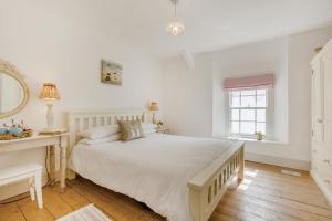 Ένα ή περισσότερα κρεβάτια σε δωμάτιο στο 2 Bed in Bideford oc-willi