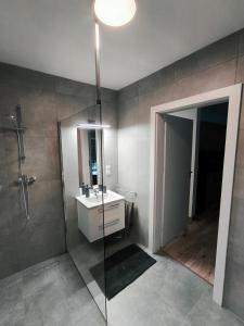 Ένα μπάνιο στο Apartament Parkowa