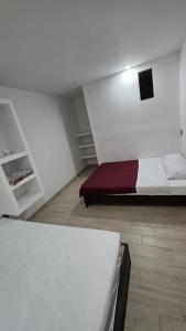 Postel nebo postele na pokoji v ubytování Hospedaje La Escondida