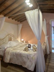 Ένα ή περισσότερα κρεβάτια σε δωμάτιο στο Casa Vacanze Il Puggio