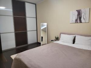 Postel nebo postele na pokoji v ubytování Seaside Forest Residence