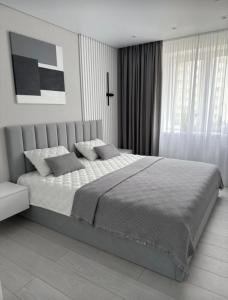 Una cama o camas en una habitación de Sirik hotel