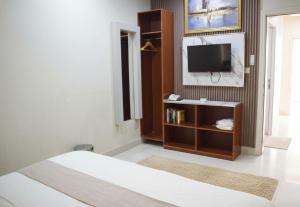 Postel nebo postele na pokoji v ubytování Al-Bayraha Hotel Apartments + 2 fotografie