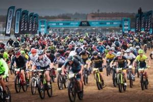 a large group of people riding bikes on a race track at T2 Port Frejus proximite de la plage Grand Garage Prive in Fréjus