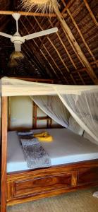 a bottom bunk of a bunk bed with a ladder at Serenity stay Kizimkazi in Kizimkazi