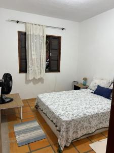 En eller flere senge i et værelse på Chale a 80 metros da praia de Maresias + 23 billeder