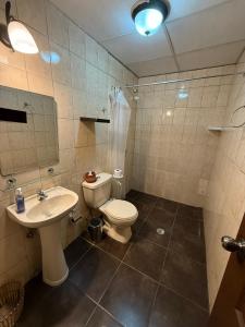 a bathroom with a toilet and a sink at La Casona de Palacio Viejo in Arequipa +47 photos