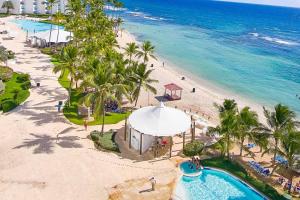 an aerial view of the beach and the ocean at Marbella Juan Dolio Beachfront in Juan Dolio