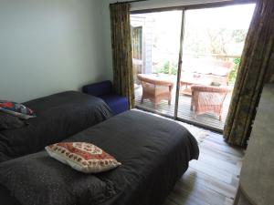 Ένα ή περισσότερα κρεβάτια σε δωμάτιο στο Cabaña San Rafael