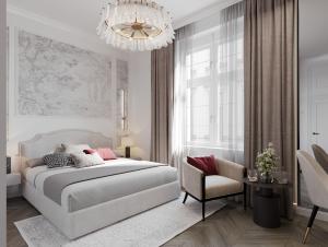 En eller flere senge i et værelse på White Gallo Residences