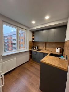 Η κουζίνα ή μικρή κουζίνα στο Stay Calm in Liepaja +9 φωτογραφίες