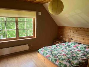 Ένα ή περισσότερα κρεβάτια σε δωμάτιο στο Kasekuma House with all comforts well located