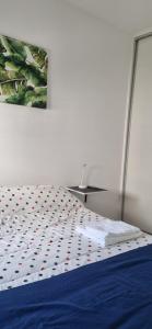 En eller flere senge i et værelse på Allegro Suites