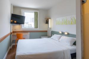 Postel nebo postele na pokoji v ubytování ibis budget RJ Praia de Botafogo + 89 fotografií