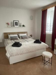 Postel nebo postele na pokoji v ubytování Alpine's Apartment