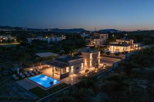 an aerial view of a house with a swimming pool at Villa Alquimia Aa with private Swimming pool in Hersonissos