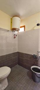 Et badeværelse på KSR Aura Homestay + 38 billeder