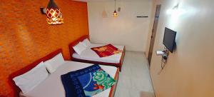 Et tv og/eller underholdning på KSR Aura Homestay