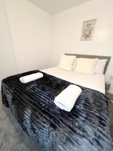 Ένα ή περισσότερα κρεβάτια σε δωμάτιο στο Modern 3 Bed