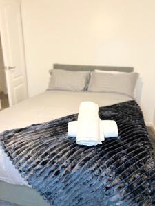 Ένα ή περισσότερα κρεβάτια σε δωμάτιο στο Modern 3 Bed