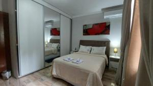 Ένα ή περισσότερα κρεβάτια σε δωμάτιο στο Casa Alegre Beach House