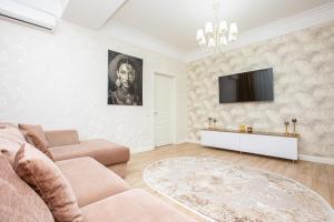 Et tv og/eller underholdning på Rose Valley Premium Residence