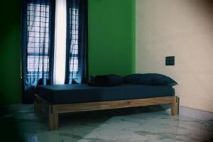 Ένα ή περισσότερα κρεβάτια σε δωμάτιο στο Saanvi by Mohanam Comfort Homes +15 φωτογραφίες