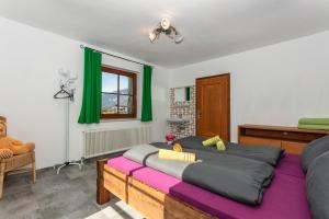 Кровать или кровати в номере Appartment Eggerhof +68 фотографий