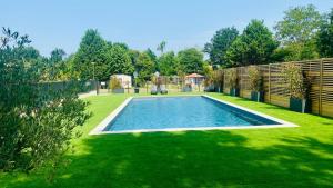 Πισίνα στο ή κοντά στο Mobil home 4 pers Sud Landes