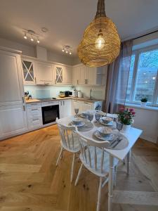 Køkken eller tekøkken på Cozy Stay Apartment + 12 billeder