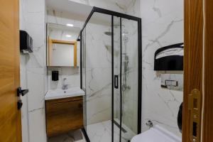 Ένα μπάνιο στο Acar Airport Hotel Plus