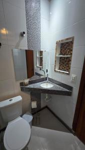 Et badeværelse på Caiçara Estadias