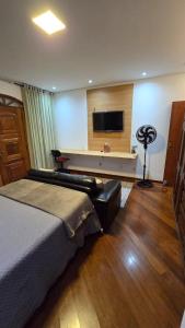 Et tv og/eller underholdning på Caiçara Estadias