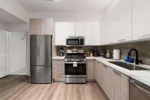 Una cocina o kitchenette en Modern 3BR Near McCormick & South Loop