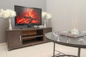 Et tv og/eller underholdning på Grace View Guest House - Fourways