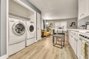 a kitchen with a washer and dryer and a counter at The Tanglewood lower suite in Chattanooga +15 photos
