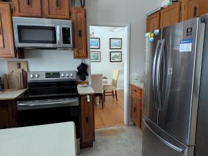 Kuchyň nebo kuchyňský kout v ubytování Bungalow in Green Area + 7 fotografií