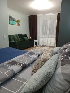 En eller flere senge i et værelse på Dolce Vita