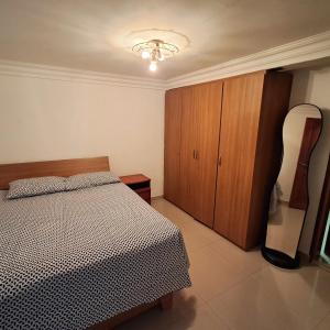 En eller flere senge i et værelse på Qta Costa Montaña