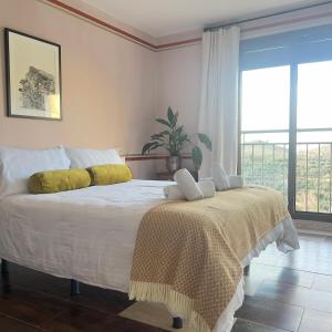 Postel nebo postele na pokoji v ubytování Casería 7 Fuentes - Casa Hotel