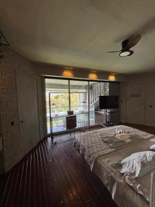 Fotografie z fotogalerie ubytování Habitación en Guatape Deluxe Standard Suite v destinaci Guatapé