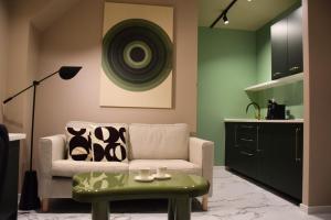 a living room with a couch and a table at STRYH21 by APT21 in Wisła +5 photos